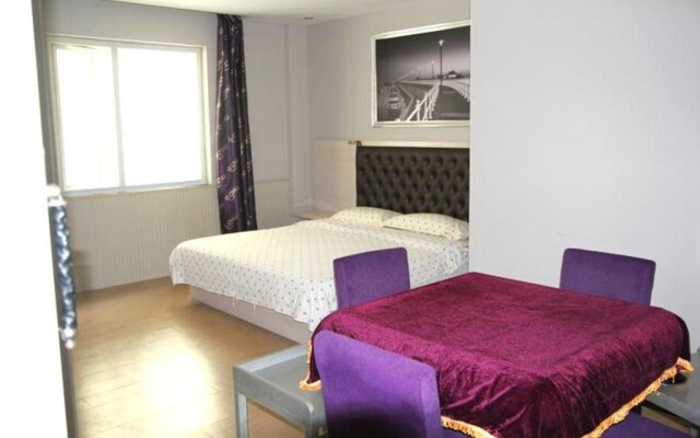 G Chu Hotel Jingzhou Sydney Impression Branch