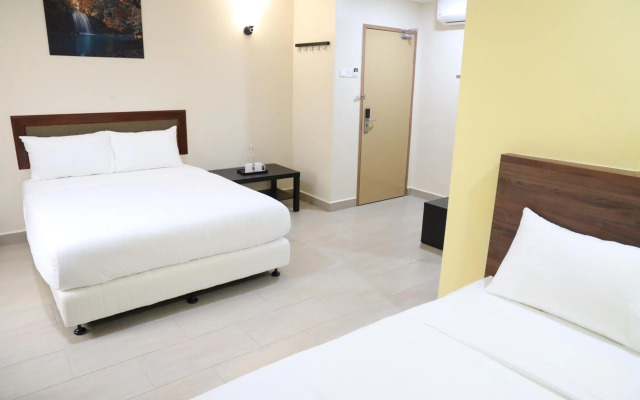 Capital O 90897 Island City Hotel