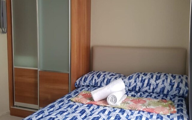 OYO 215 Sunshine City Suites