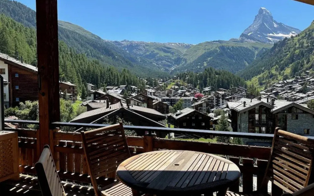 Mountain Exposure Luxury Chalets & Penthouses & Apartments