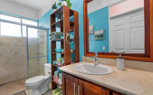 Modern Top-Floor Condo with Panoramic Views and Community Pool