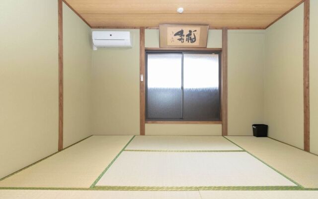 Jyuraku Tomi