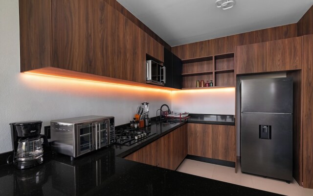 Angelina 28 Beachfront and Family Apartments - Modern and Relaxing Long Stays (20 min from Cancun Airport)