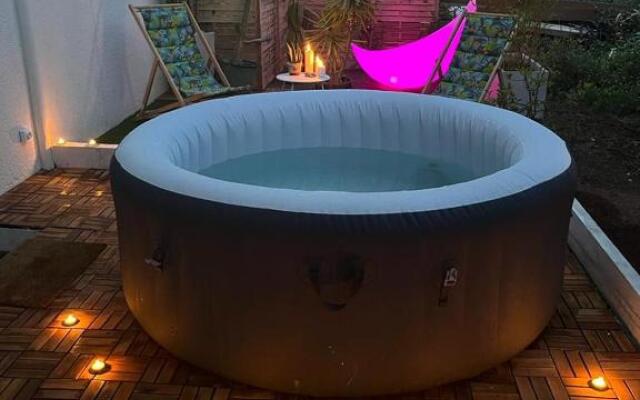 Superbe appartement avec jacuzzi avec jardin privé