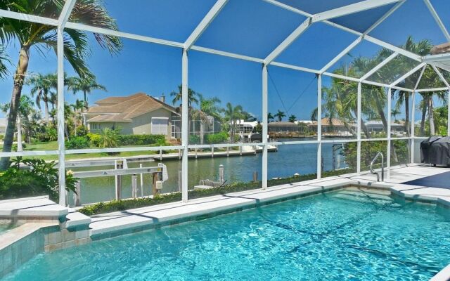 Relaxing Waterfront Home With Pool and Steps to Beach