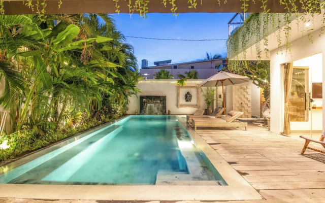 Luxury 4BR Haven, Steps to Canggu's Beach Elegance