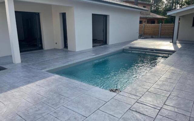 Villa Lacanau avec piscine chauffée