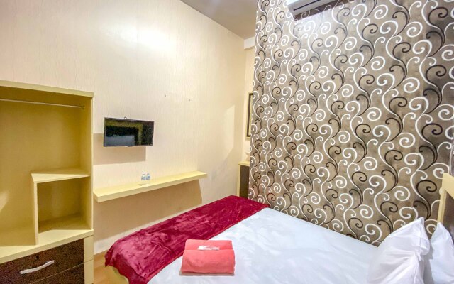 Tini's Guest House Malang RedPartner