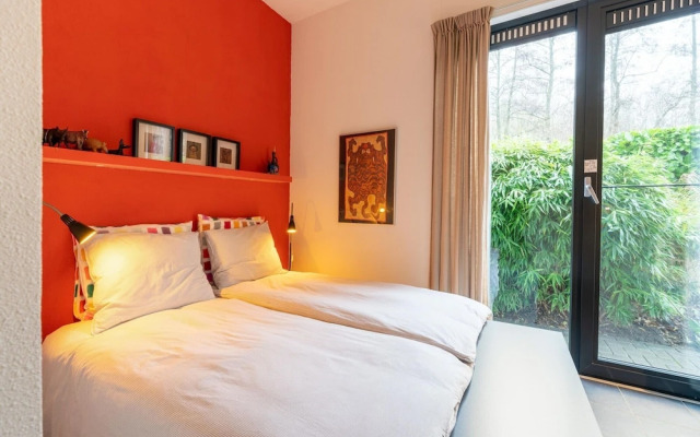 Cozy Forest Villa on the Water Near Harderwijk