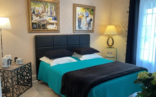 Villa l'Olivier, Chambre d'Hôtes Les Volets Bleus