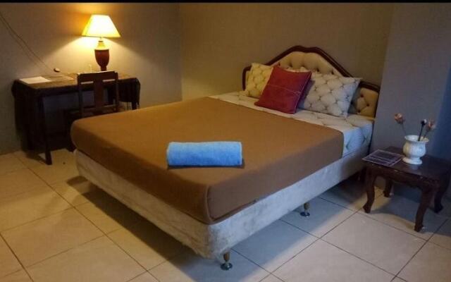 The Carstensz Homestay by ZUZU