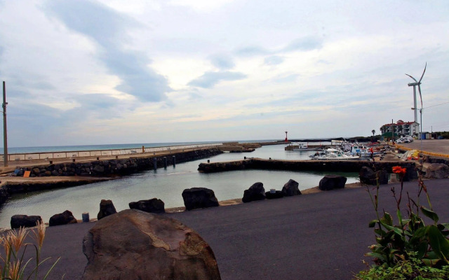 Windmill and Sea Pension