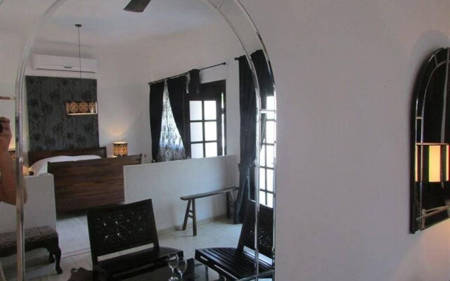 Nina Suites Hotel and Cafe