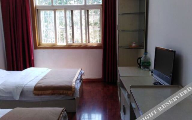 Xuanwei Shenghui Business Hotel