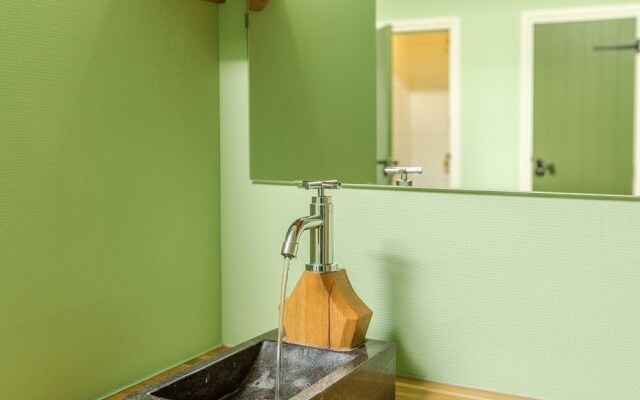 Nice house with a garden, surrounded by forest