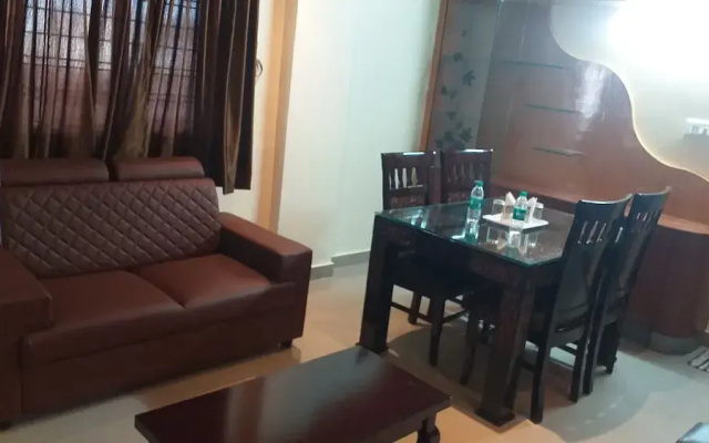 the Nisarga Grand   boarding & lodging