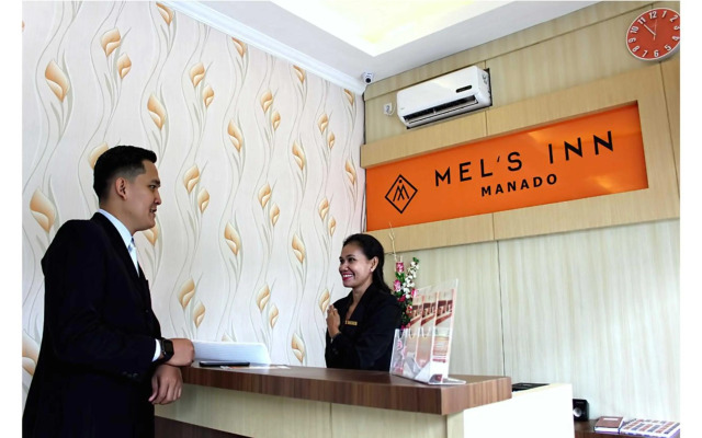 Airy Mapanget AA Maramis Manado
