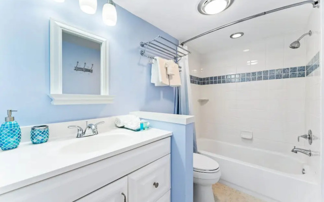 Coastal Surfside by Beachside Management