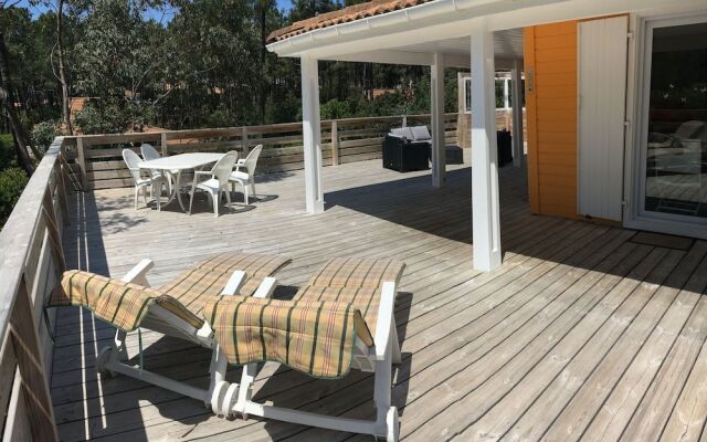 Chalet Orange Naturiste la Jenny