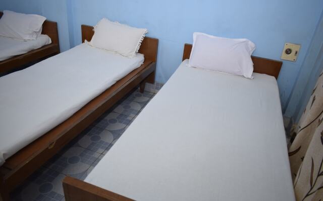 Parisha Residency - Temple Side Hotel