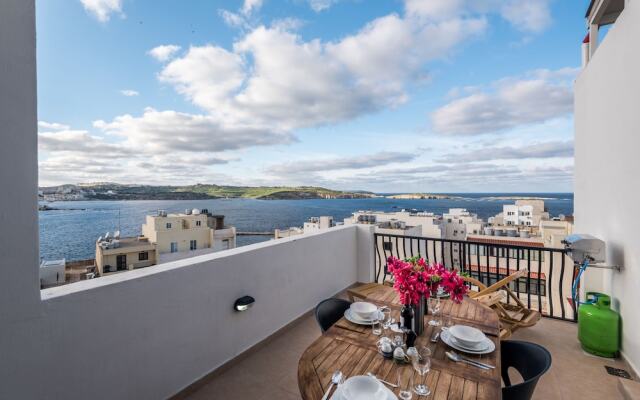 Seashells 2 bedroom Apartment with sunny terrace with stunning panoramic sea views by Getaways Malta