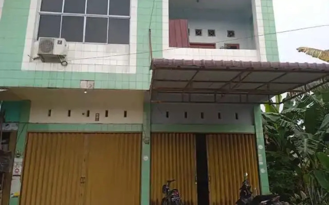 OYO 93192 Andesta Guest House SyariahNearAgrowisata Sungai Pinang Agro Nadin