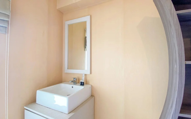 Warm And Homey 2Br At Green Bay Pluit Apartment