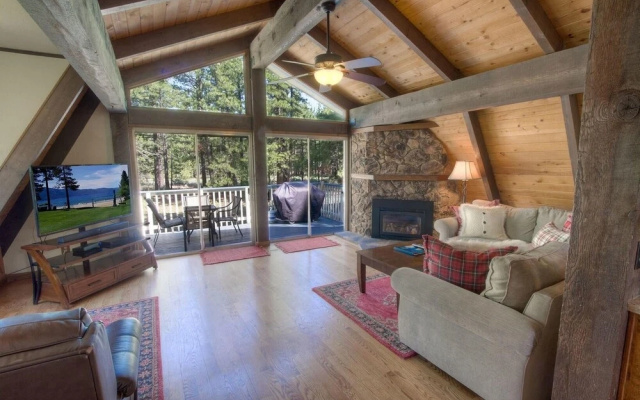 Remodeled Gambrel Style Home with Trees Views by RedAwning