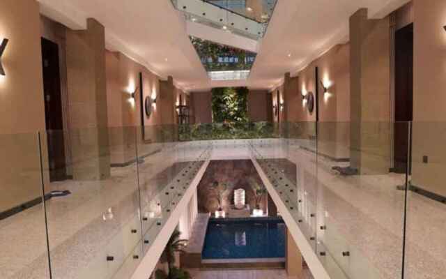 De Lobby Suite Hotel