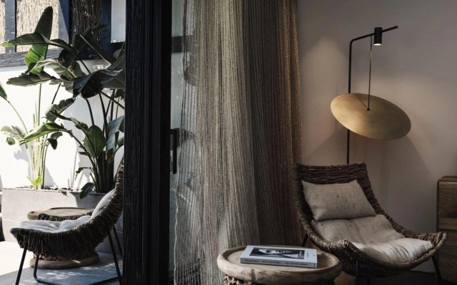 O by Myconian Collection