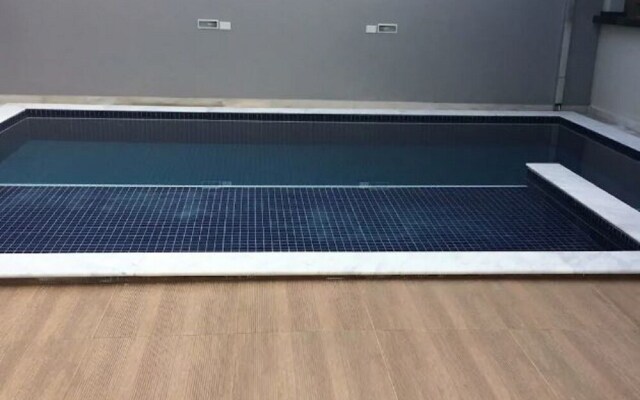 Casa com piscina em Caraguatatuba