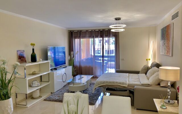 Casares Beach Golf Apartment With Private Garden and Pool Access