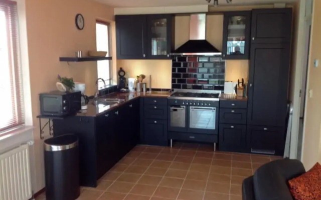 Bungalow in Breskens With Waterfront Jetty