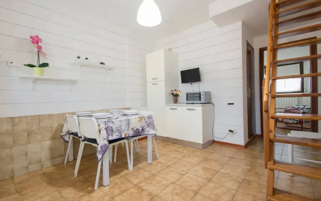 ALTIDO Lovely 1BR flat with patio and parking