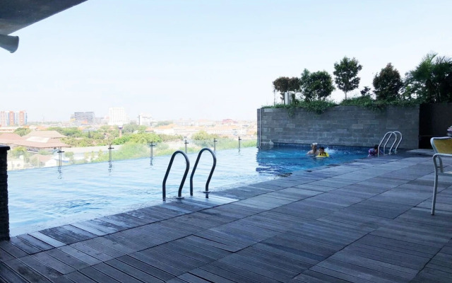 Cozy Studio With City View At Tamansari Papilio Apartment