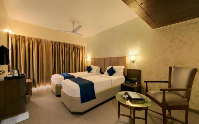 Central Beacon Hotel Surat – Guest Rooms – Surat