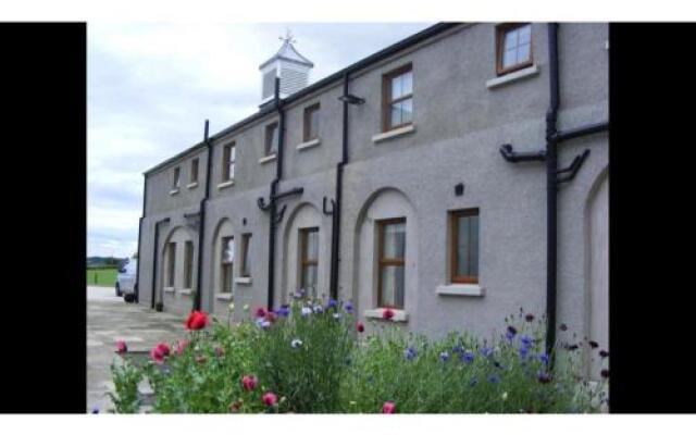 Flatfield House & Clock Tower Coaching Apartments