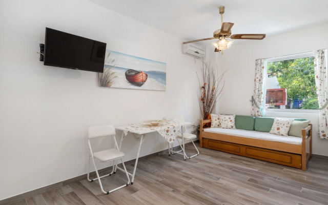 M K Apartments