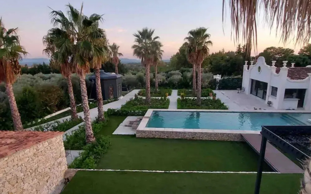 Chambre Luxe Piscine Jardin vue Solarium Palmeraie