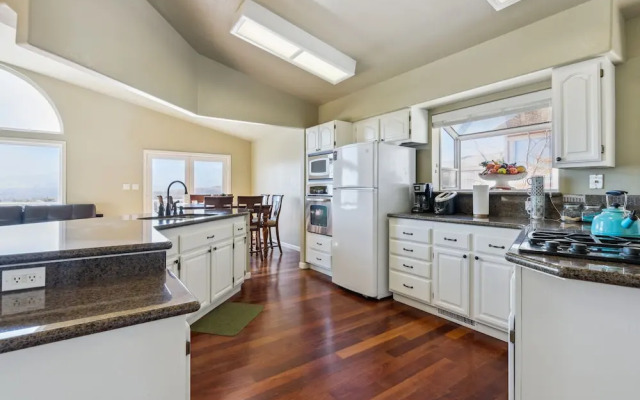 Elegant Escape 4 Bedroom Home by RedAwning