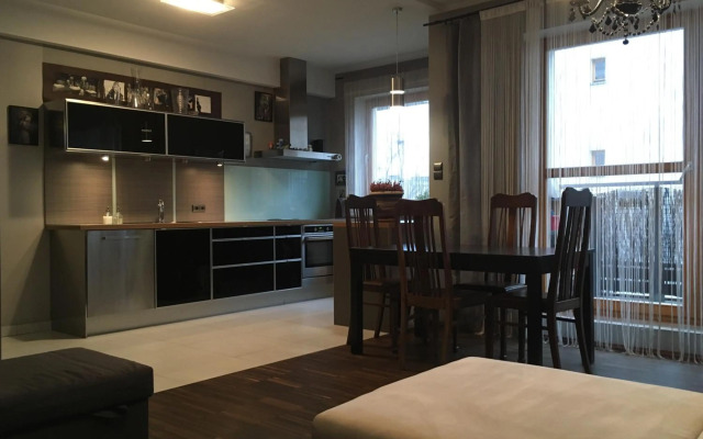 Chełmska 9, next to Olinek