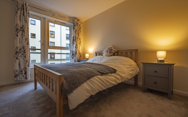 Elegant 2BR Apartment with Balcony and Parking