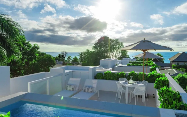 Palm Grove Villas & Hotel
