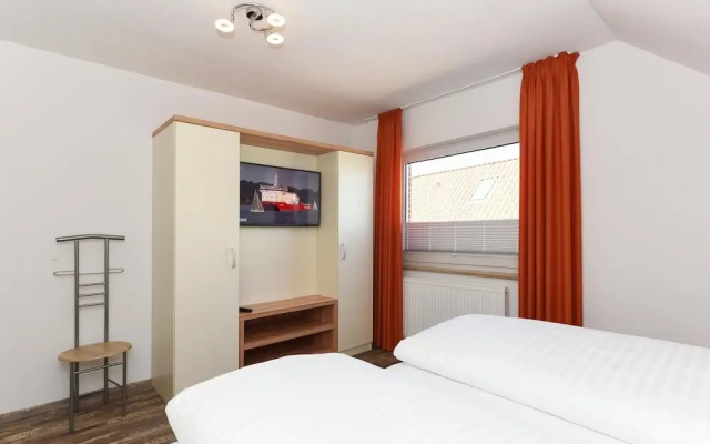 Ferienwohnung Balkon zur Sonnenseite in Bensersiel