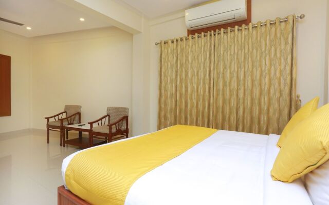 Capital O 14702 Kovilakam Residency