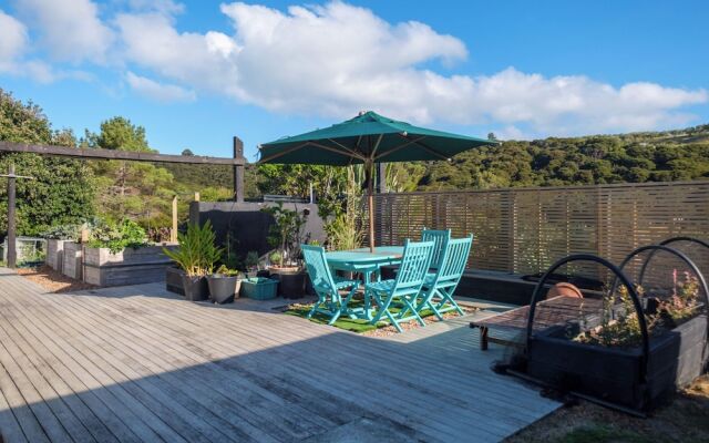 Wharetana Bay Villa with beach walkway