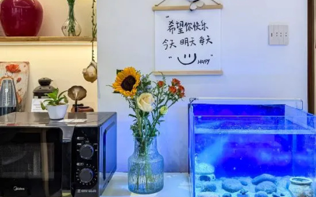 An Yu Vision Wooden Tone Movie Watching Boutique Stay (Millennium City Park) – Guest Rooms – Kaifeng