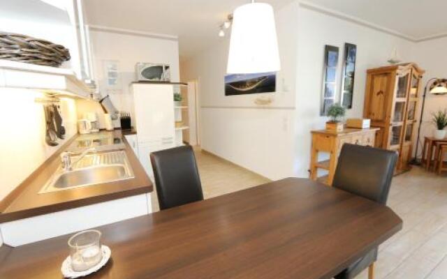 Kurparkresidenz Baabe - Ferienwohnung Meeresgarten mit Terrasse