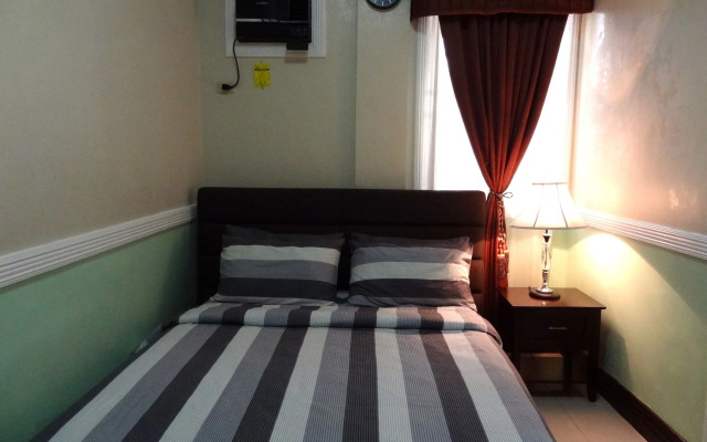 The Executive Villa Inn & Suites