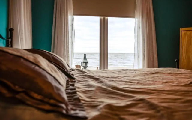 Les pieds dans le sable